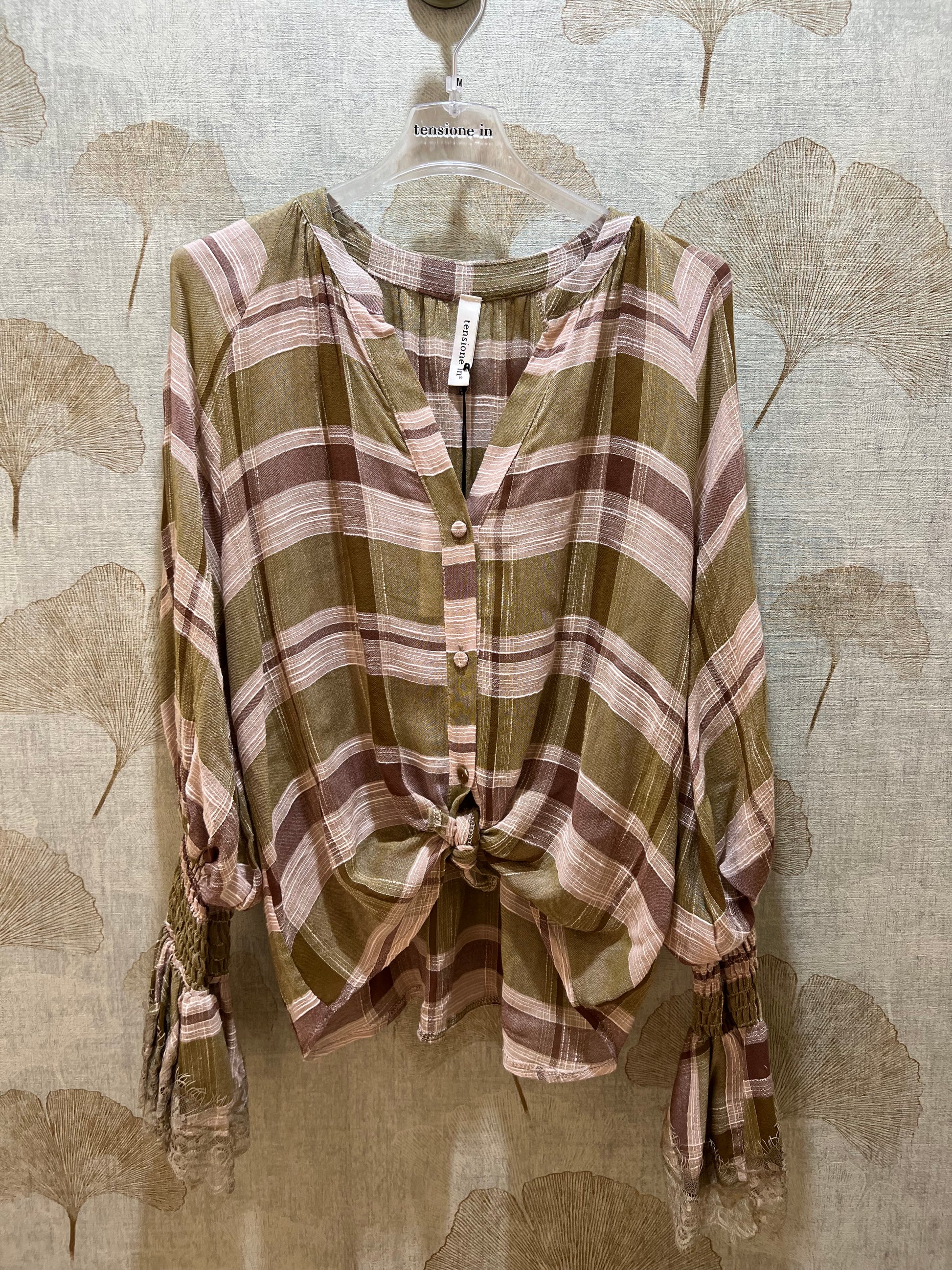 Camicia scacchi tensione in